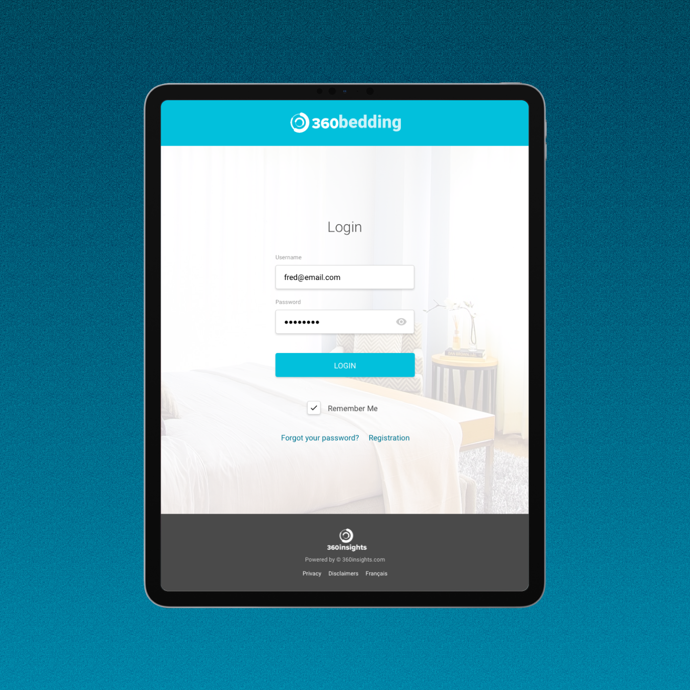 Graphic of a typography specimen showing the alphabet and numerals on top of a dark gray background.