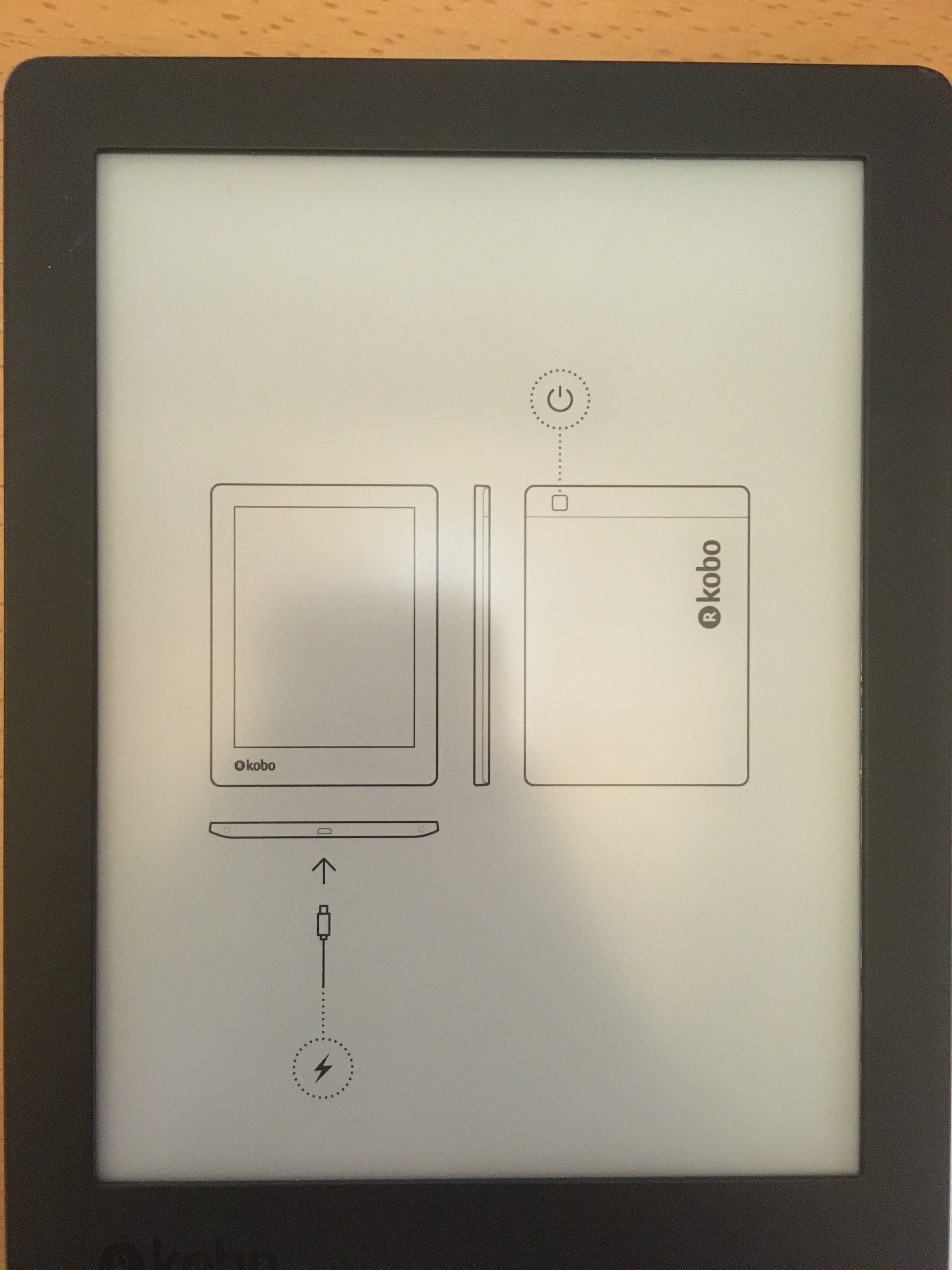 Graphic of a typography specimen showing the alphabet and numerals on top of a dark gray background.